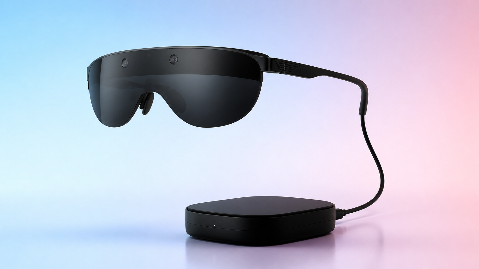 a sleek glasses-shaped VR headset resting on slim nose pads, one thin cable running down to a small waist-mounted compute puck clipped to a belt, clean studio light, shallow depth of field, no text